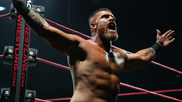 Steve Maclin poses on the ring apron at an Impact Wrestling event